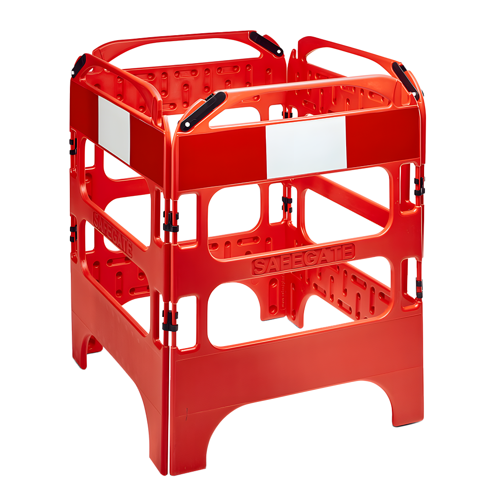 A red four-sided plastic barrier used for construction or safety purposes