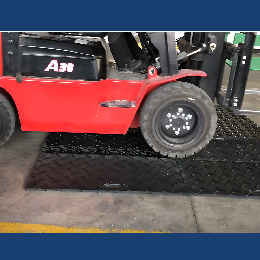 Forklift running on the Heeve Traction Guard Vehicle Access Mat