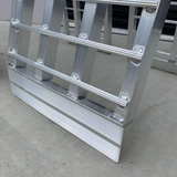 A detailed view showcasing the aluminium welds and robust structure of the Heeve loading ramp, demonstrating its heavy-duty construction.