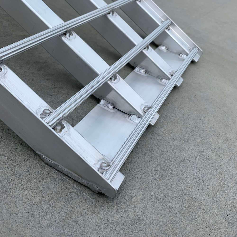 An angled close-up of the ramp base, showing the strong aluminium structure and support bars welded at the base for increased durability