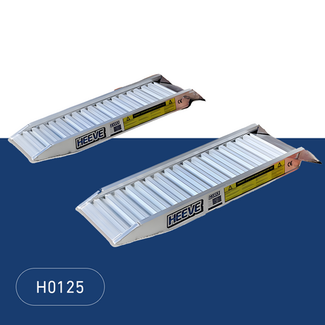 Two Heeve aluminium loading ramps positioned side by side on a blue background, showcasing their durable and sleek design