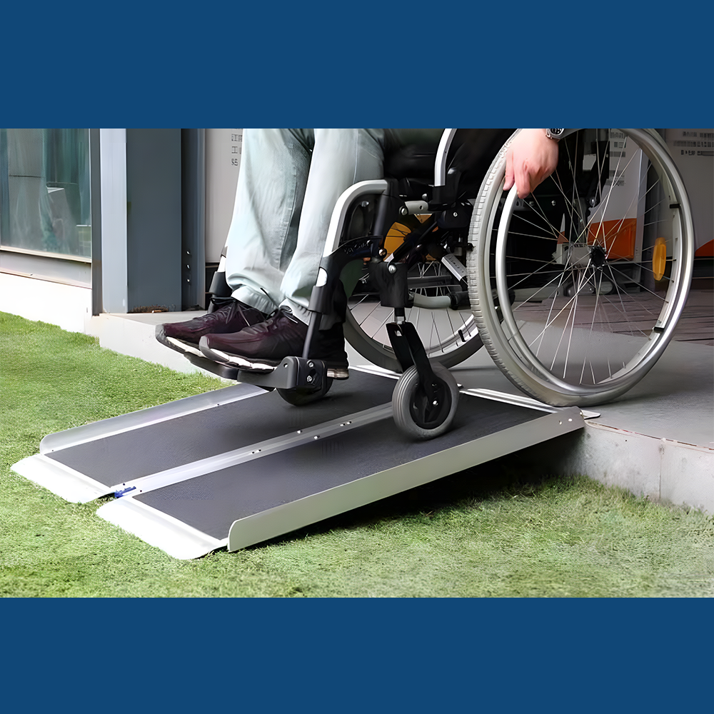 Heeve aluminium single-fold ramp positioned on artificial turf leading to a door, showcasing its suitability for indoor and outdoor use