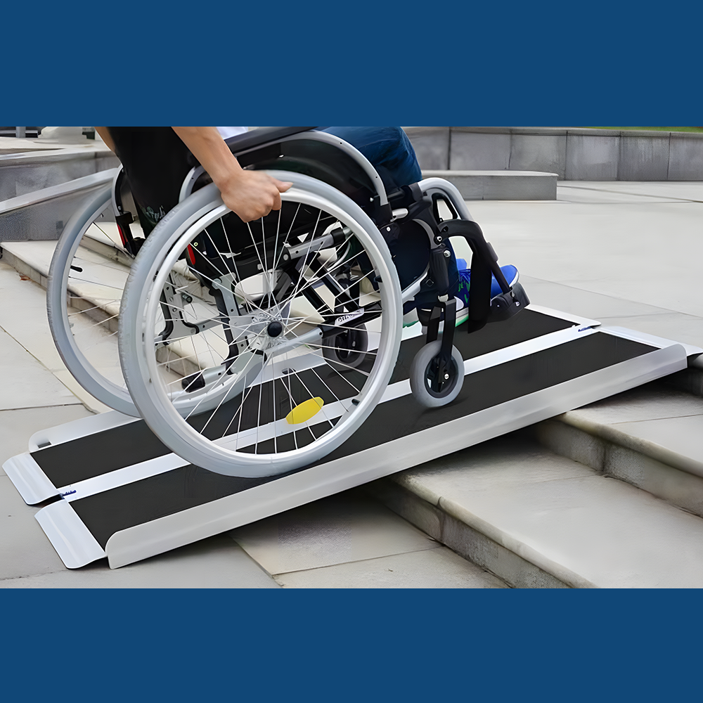 Wheelchair moving up the Heeve ramp placed on concrete steps, demonstrating its smooth and accessible gradient for mobility aid