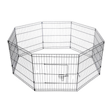 A black, octagonal wire fence enclosure for pets. The fence is made from metal panels connected together to create a play area for puppies or small animals.