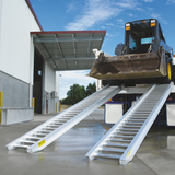 backhoe on the ramp and truck